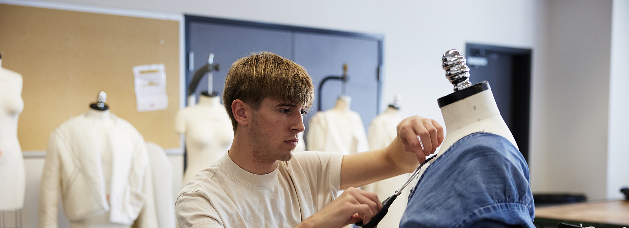 Student working on a fashion project