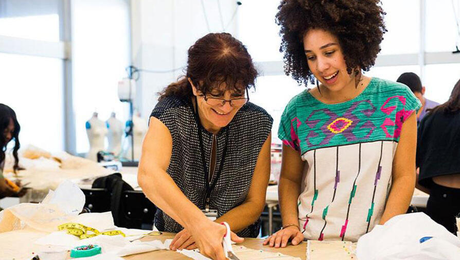 Student and professor working on design project