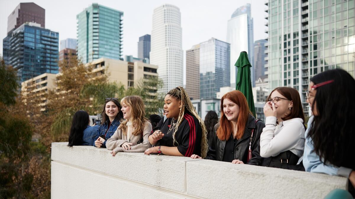 Group of students gathered overlooking campus